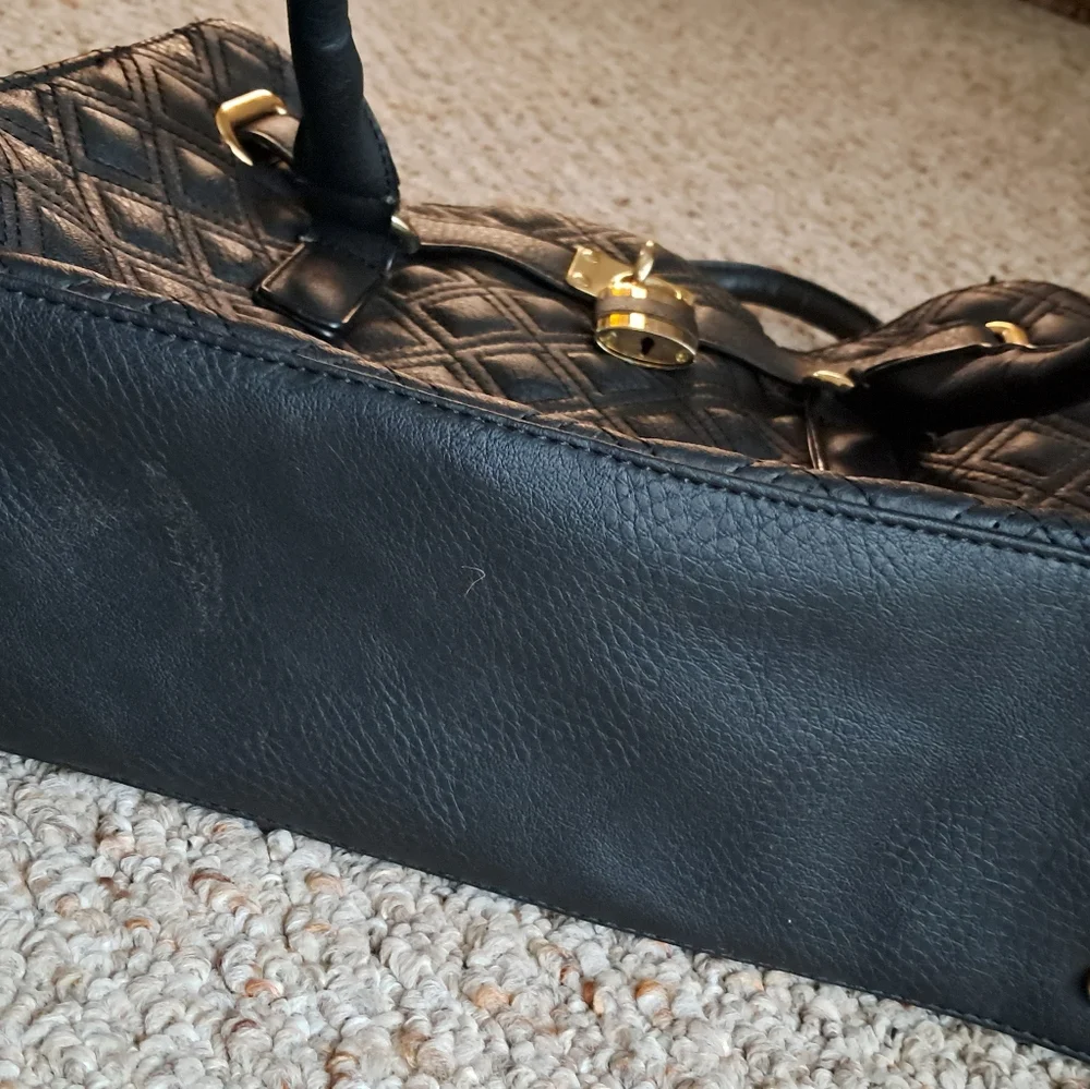 Black Quilted Handbag with Gold Accents